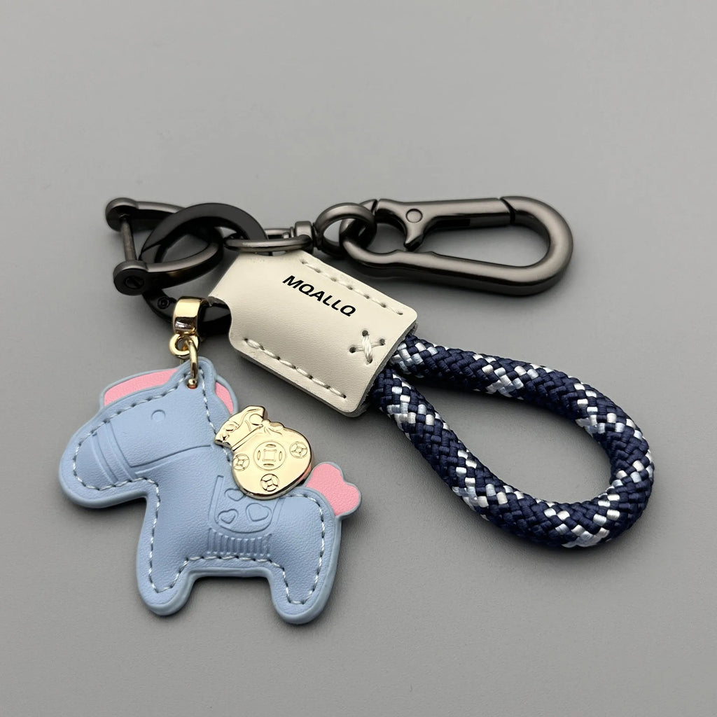 Handmade cowhide leather key ring pendant with zinc alloy pony buckle and coloured flanelle rope.