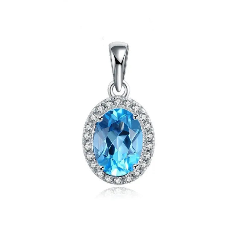 925 sterling silver geometric jewellery set with blue topaz gemstones including earrings, ring, pendant and necklace