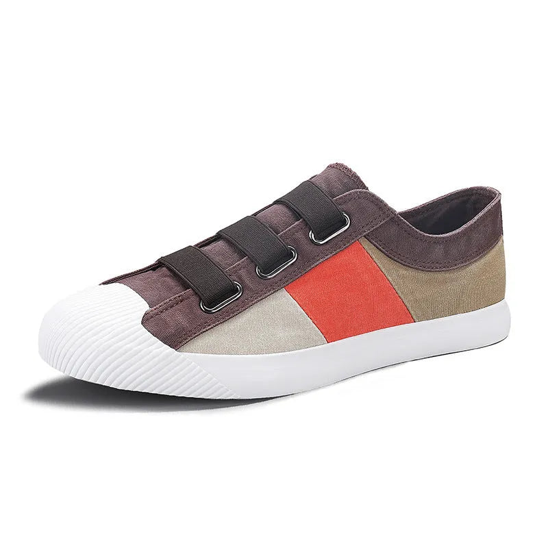 Men's low-top canvas sneakers in beige with an elastic band and vulcanised rubber sole.