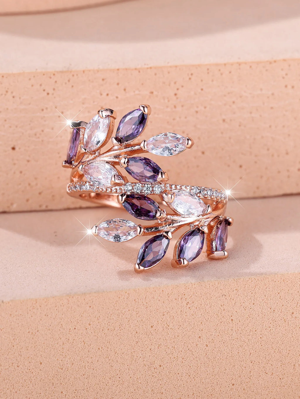 Adjustable copper leaf ring with zircon stones in multiple colour options including sapphire blue and white diamond