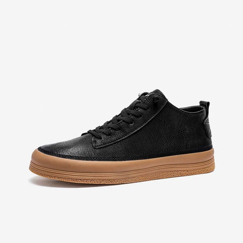 Men's black leather casual shoes with round toe and flat rubber sole on white background