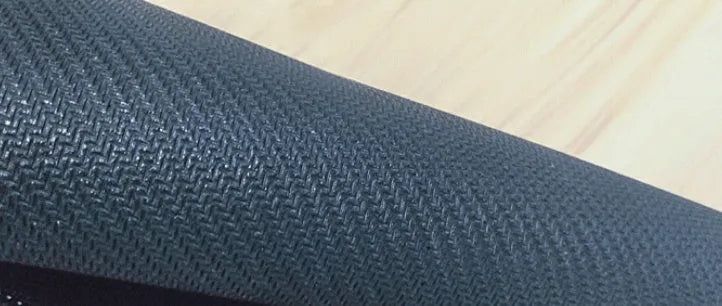 Large natural rubber mouse pad with thermal transfer pattern on desk showing non-slip base and multiple size options