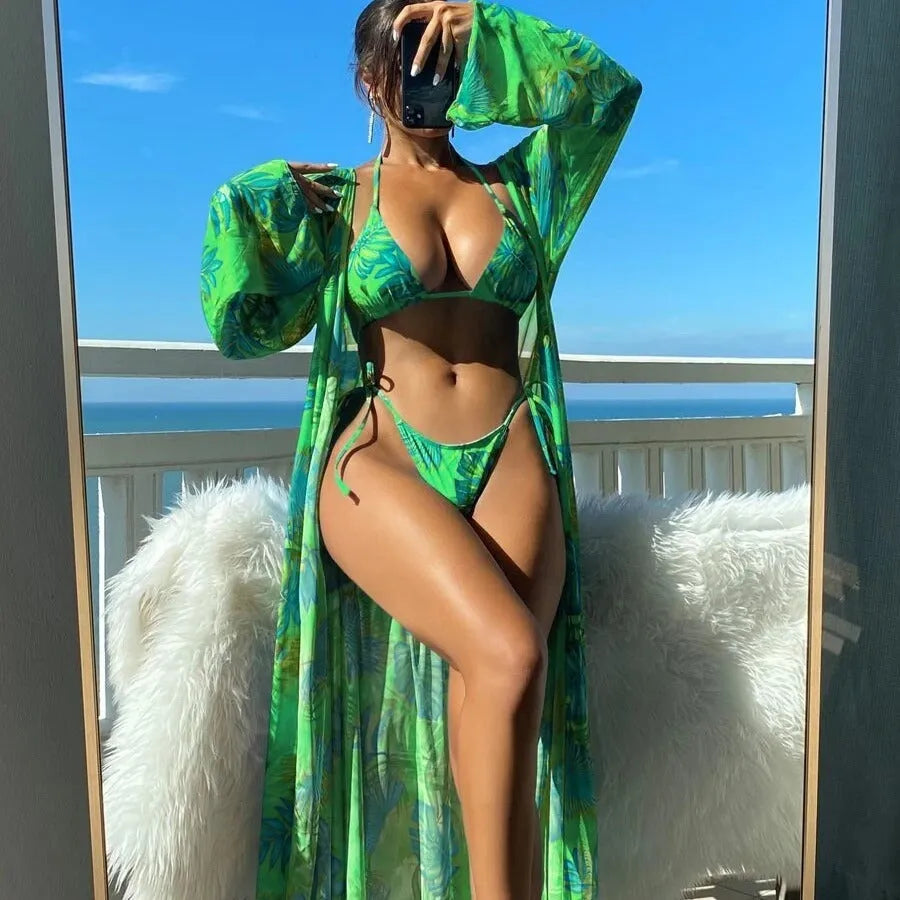Floral pattern swimwear set with long sleeve blouse, banded bikini briefs, and matching outer robe in multiple colour options