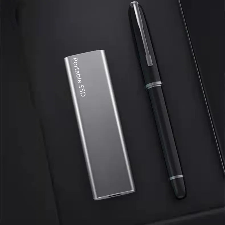 Ultra-thin metal-shell mobile SSD external hard drive in red, black, blue, or silver with capacity options from 500GB to 30TB