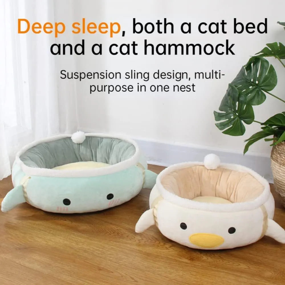 Green chick-shaped cat bed shown both hanging as a hammock and lying flat on the floor.