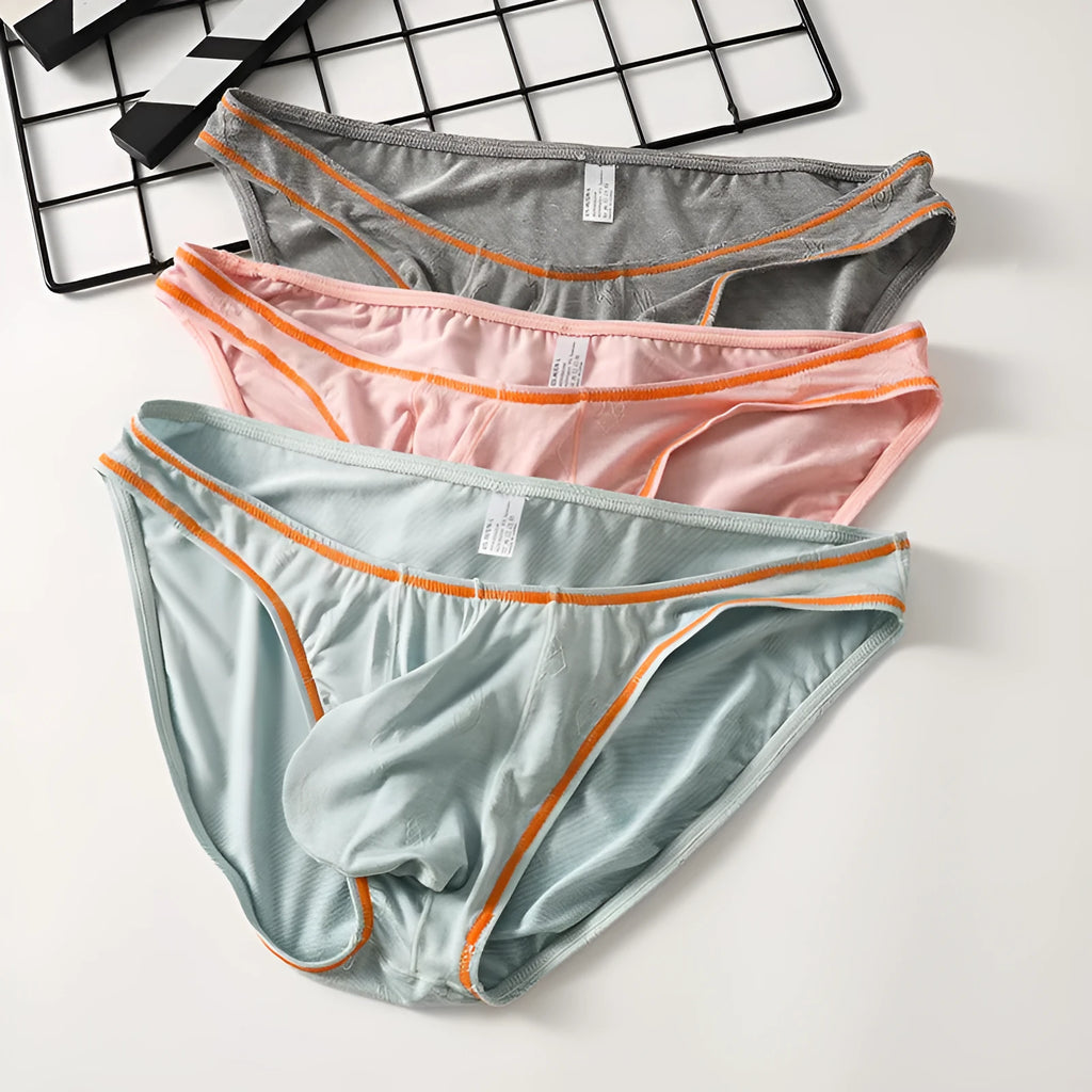 Men's ice silk modal underwear with butt-lift design in multiple colours.