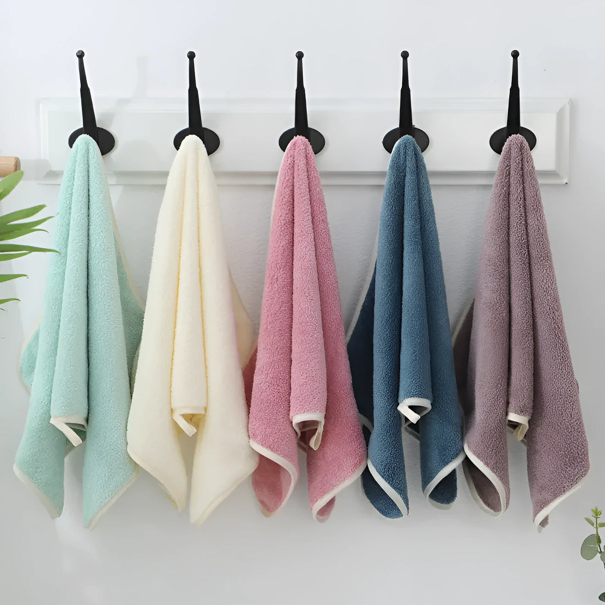 Thickened high density coral fleece face towel 30x60cm with plain weave and edging, shown in available colours for face washing