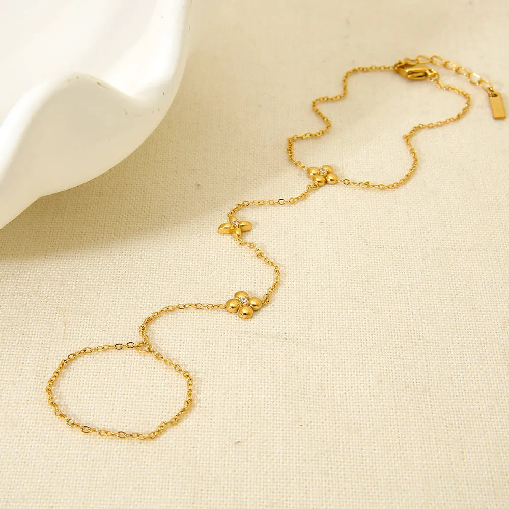 Gold colour stainless steel bracelet with flower and eight-pointed star geometric design for women
