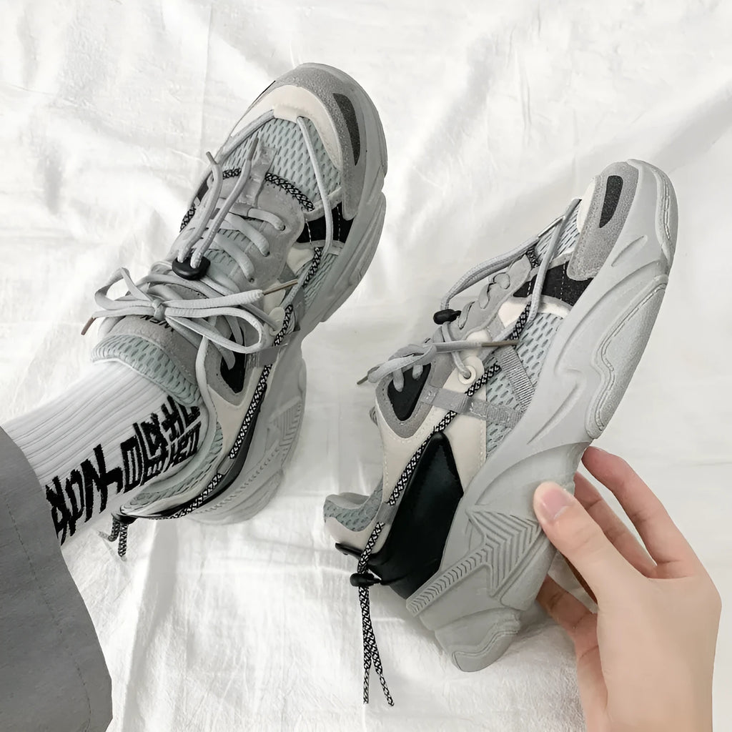 Men's white Korean-style platform sneakers with lace-up front on a plain background.