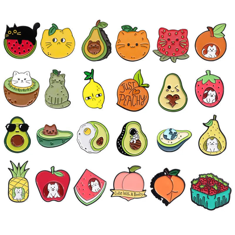 Colourful cartoon fruit and letter design metal brooch pin on a solid background.