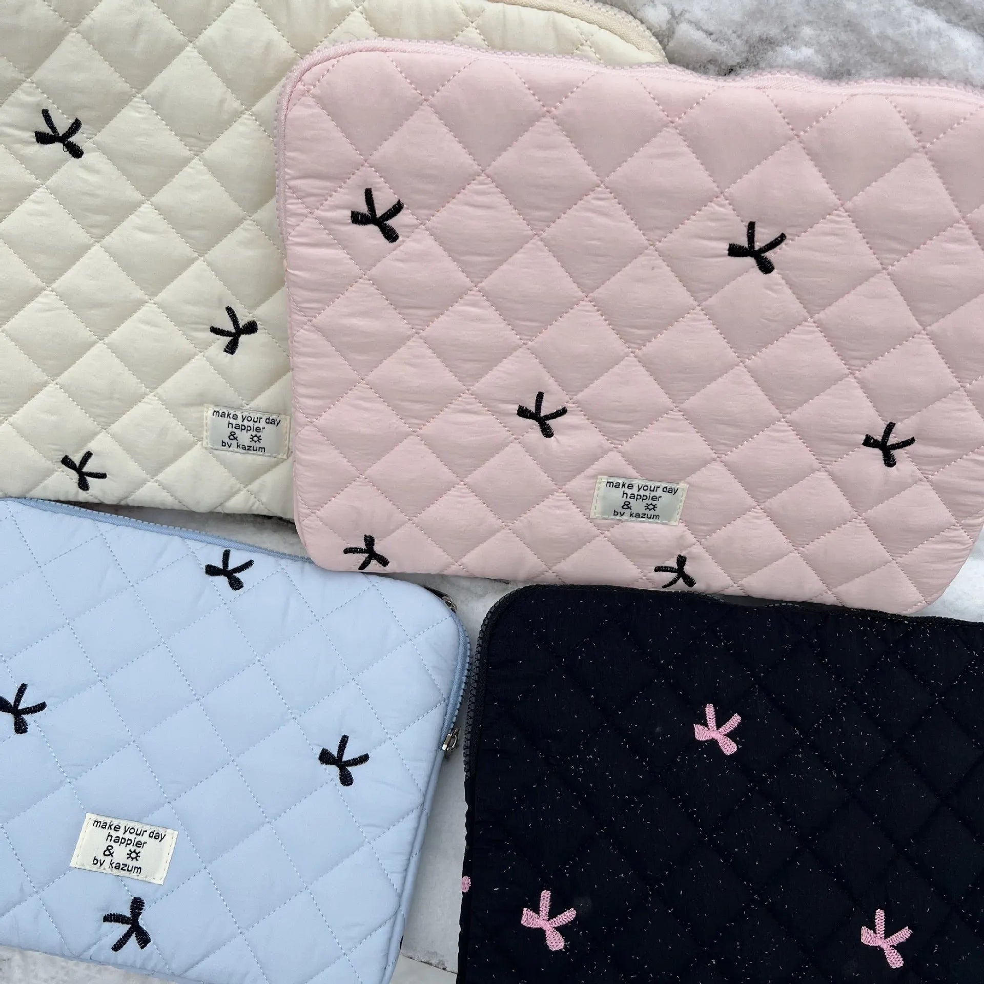 Nylon notebook storage bag with rhombus embroidery and bow detail in multiple colour options