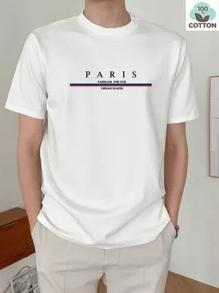 Man wearing a loose fit pure cotton t-shirt with a printed letter design on the front in apricot colour.