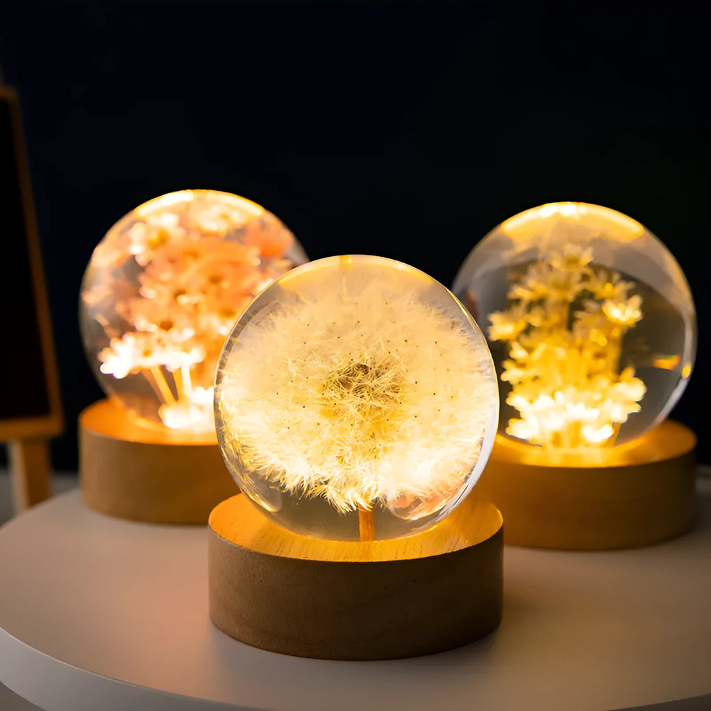 Preserved dandelion inside a glowing 60mm crystal ball on a beech wood stand, USB desktop night light.