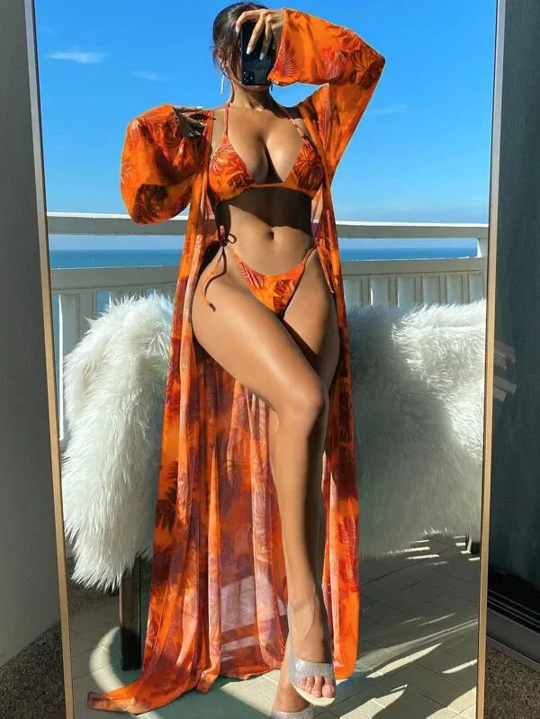 Floral pattern swimwear set with long sleeve blouse, banded bikini briefs, and matching outer robe in multiple colour options