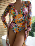 Women's floral print bikini three-piece swimsuit with a matching coat, shown in one of seven available colours.