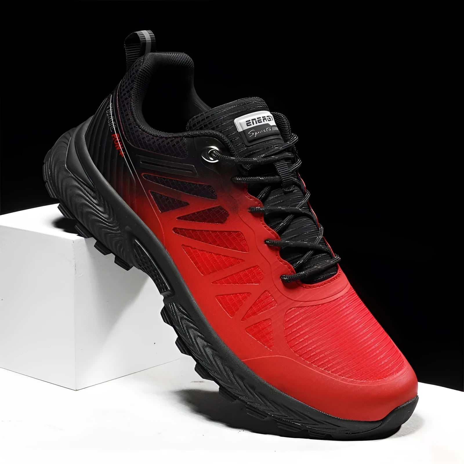 Men's plus size outdoor running shoes with breathable mesh surface in black colour with orange accents