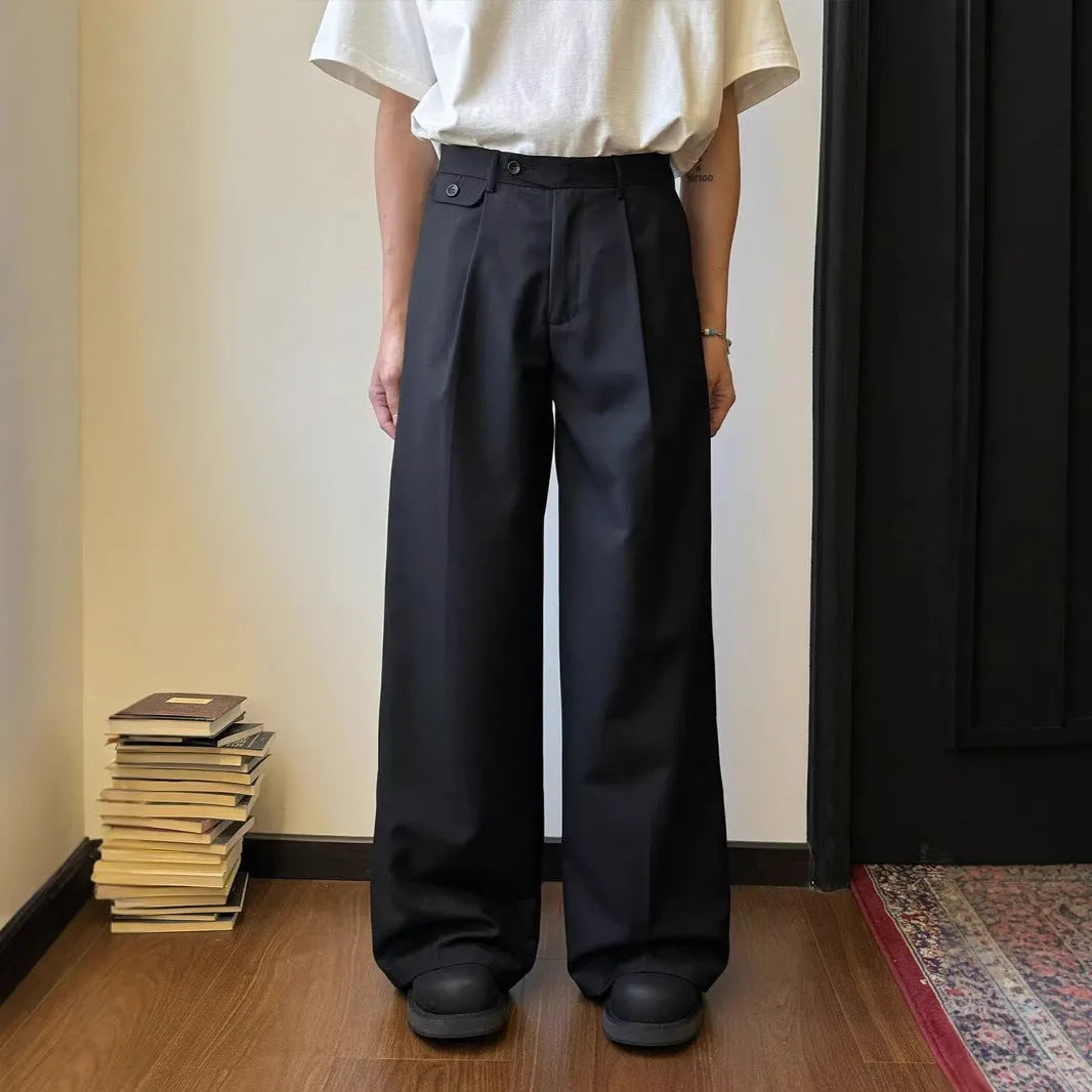 Men's straight-leg suit trousers in brown with wide-leg fit showing front and side views.