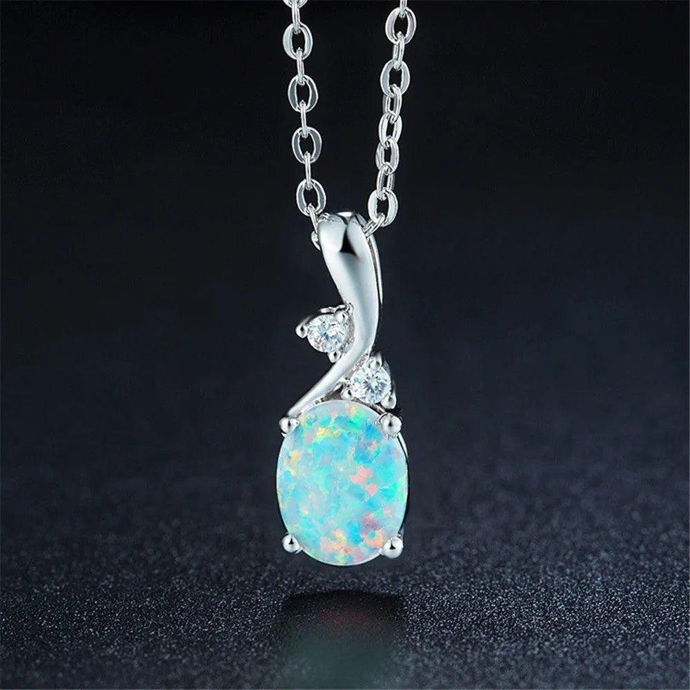 Water drop shaped opal pendant necklace with adjustable chain in rose gold or white finish