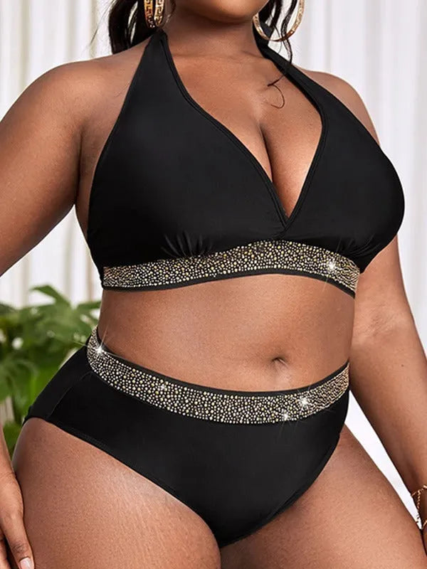Black plus size women's bikini set with matching bra and shorts for swimming