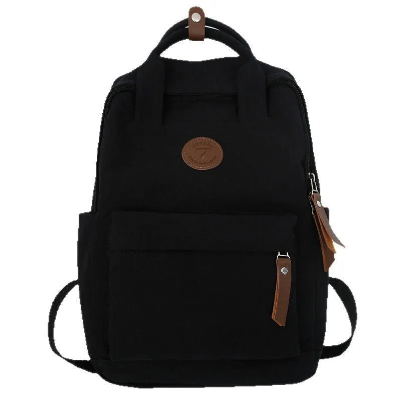 Black Oxford cloth retro backpack with curved shoulder straps for school and travel