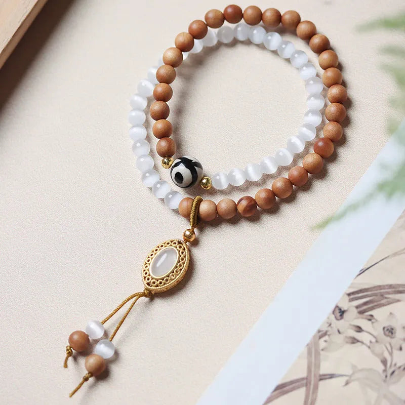 Retro unisex bracelet with sandalwood opal Tibetan beads and mixed material construction