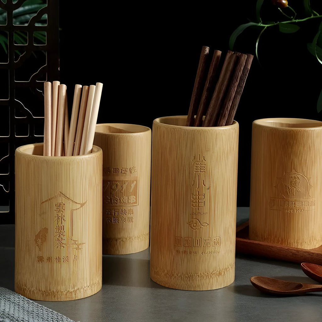 Natural wild bamboo chopsticks holder tube for kitchen organisation on a wooden surface.
