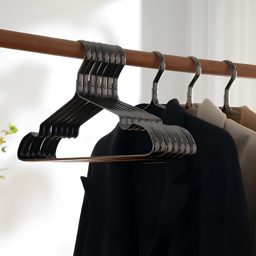 Elegant black non-slip anti-rust clothes hanger on a white background.