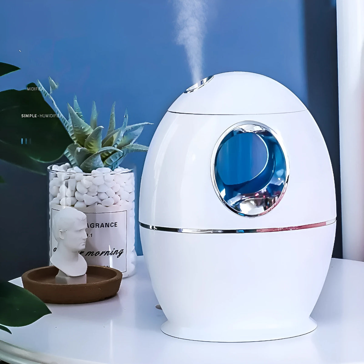 White columnar household air disinfection humidifier with USB cable on a table