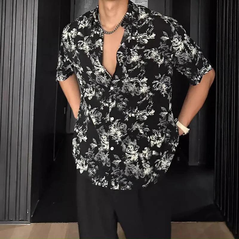 Loose casual short sleeve shirt with a floral print in a cardigan style.