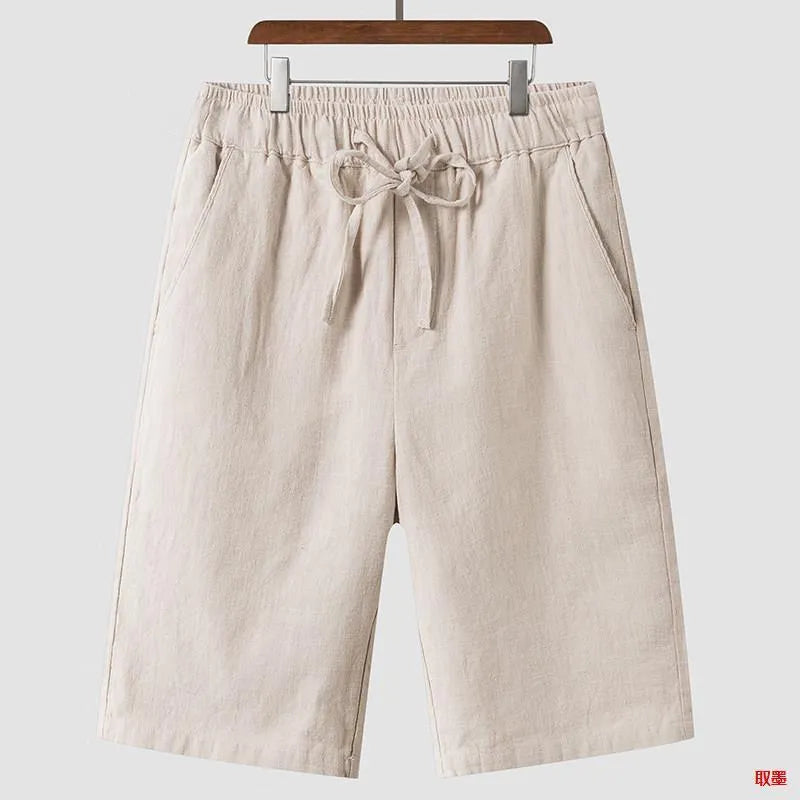 Men's linen casual shorts in beige colour with loose cropped fit and elastic waistband