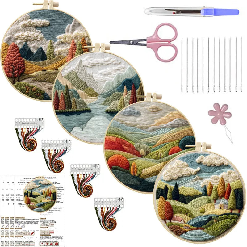 DIY landscape embroidery kit with bamboo frame, printed fabric, and thread on a table