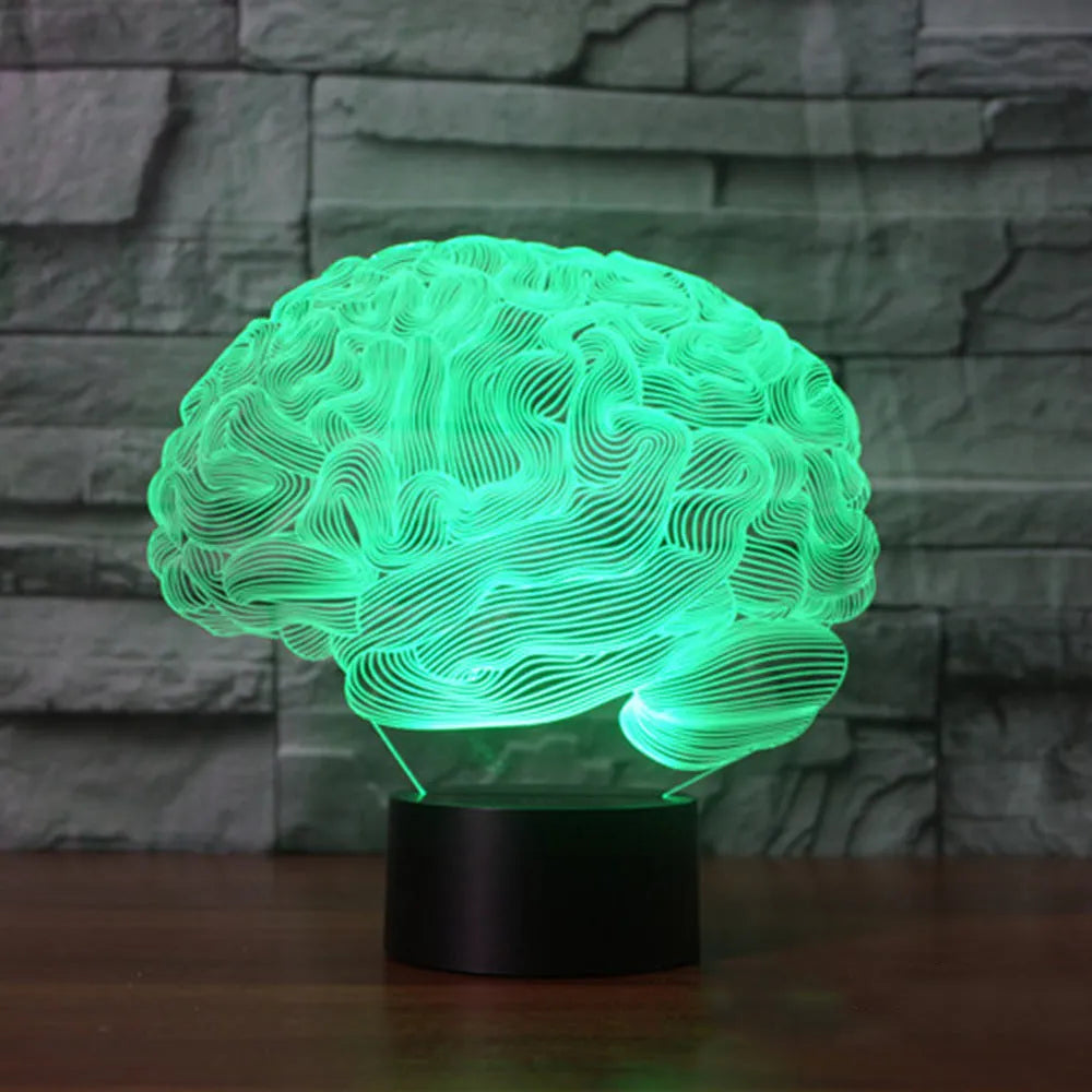 3D acrylic brain illusion LED desk lamp with colour changing remote control on wooden desk