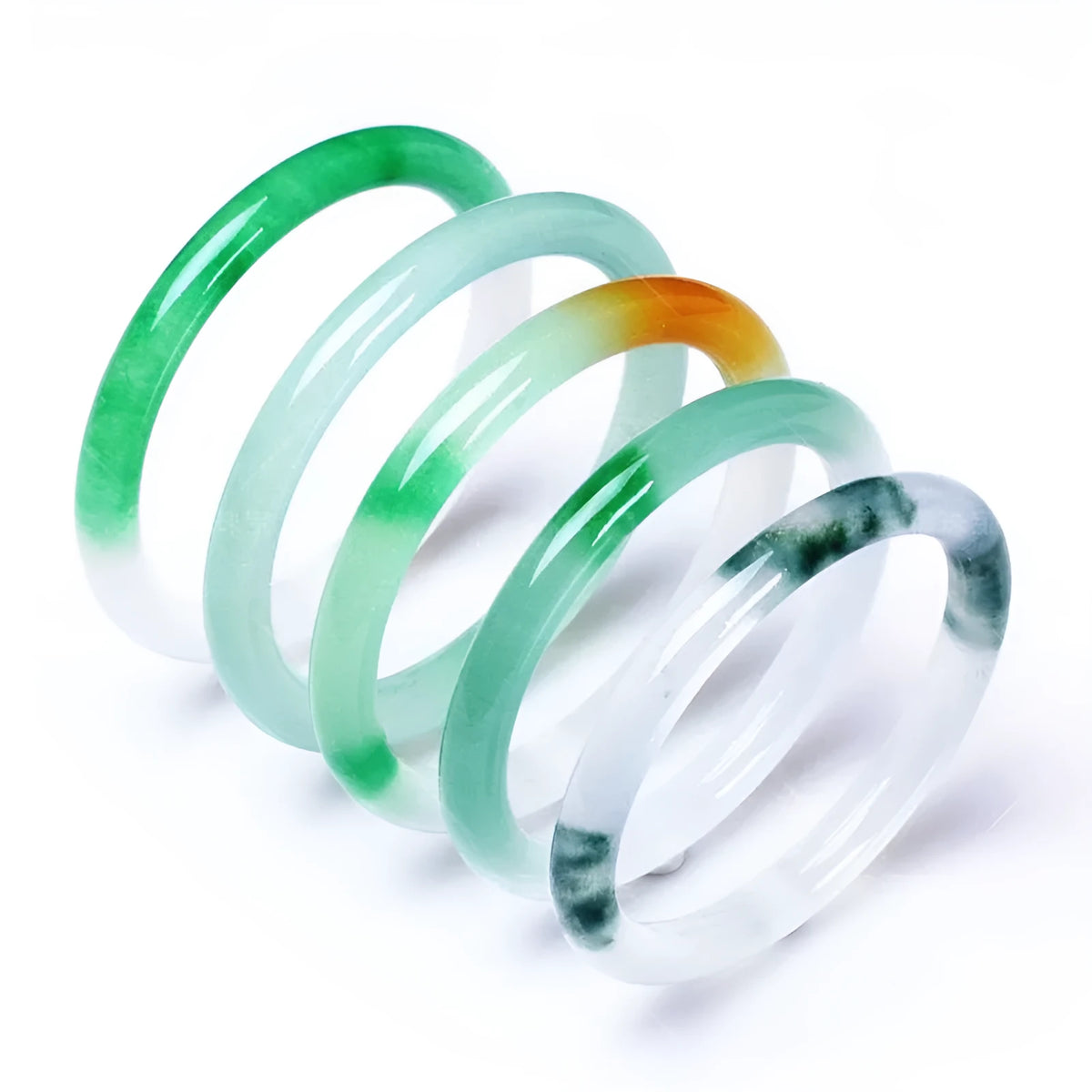 Jade bracelet with floating flower design and auspicious cloud patterns in green colour variation