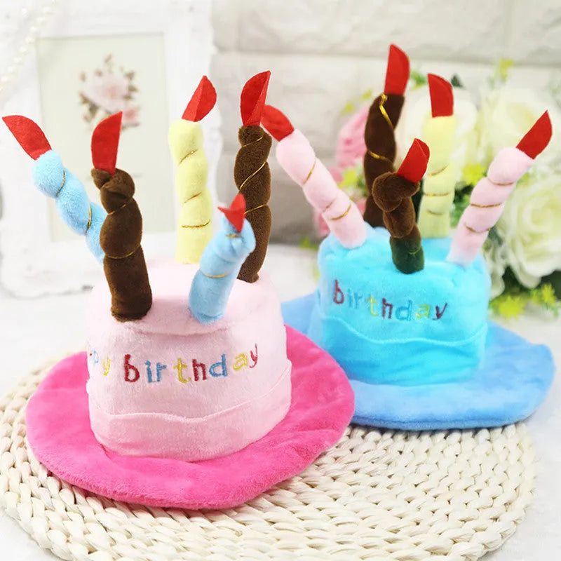 A blue or pink birthday hat for small dogs, shown with dimensions of 21cm by 15cm.