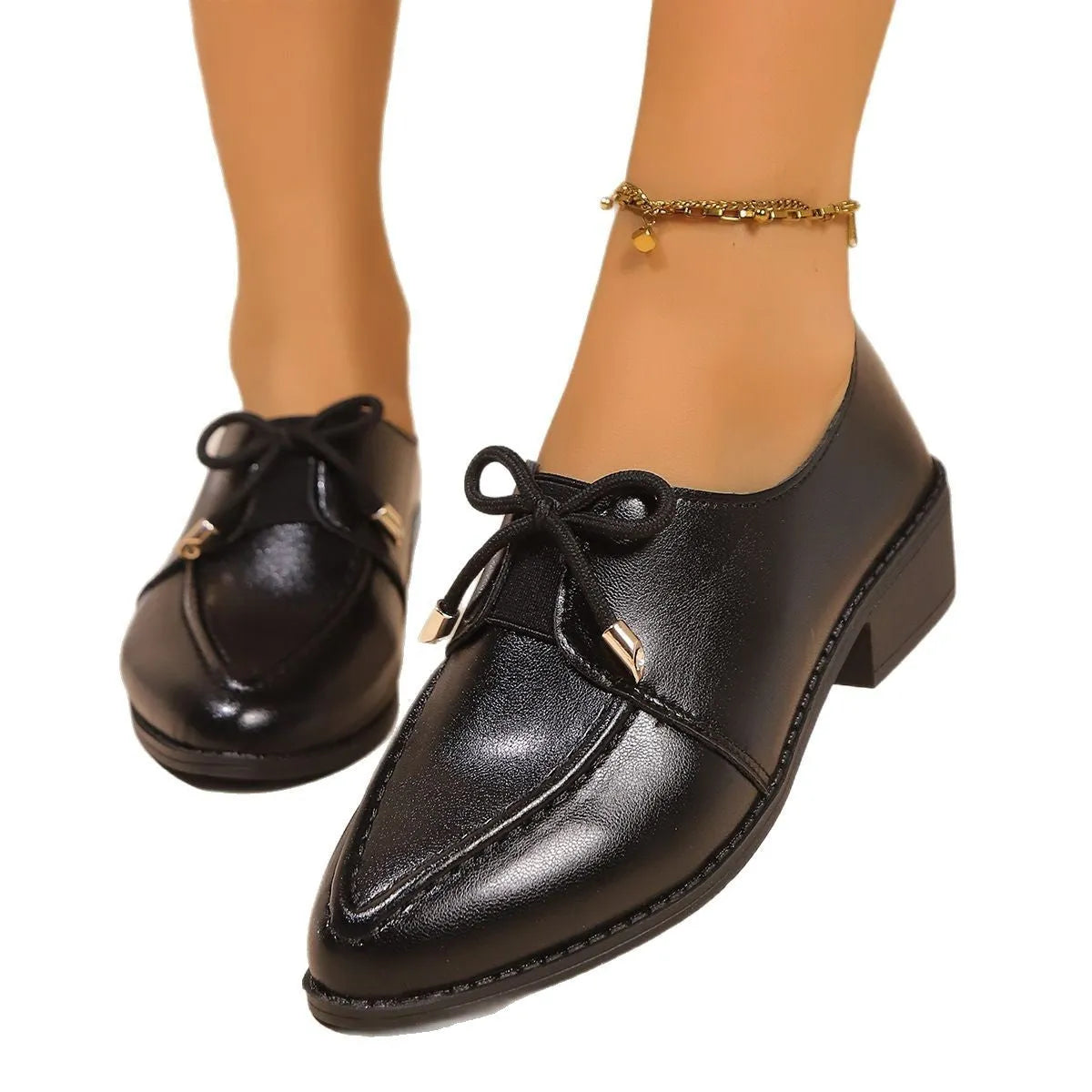 Women's British-style leather shoes with decorative bow detail and pointed toe in multiple colour options