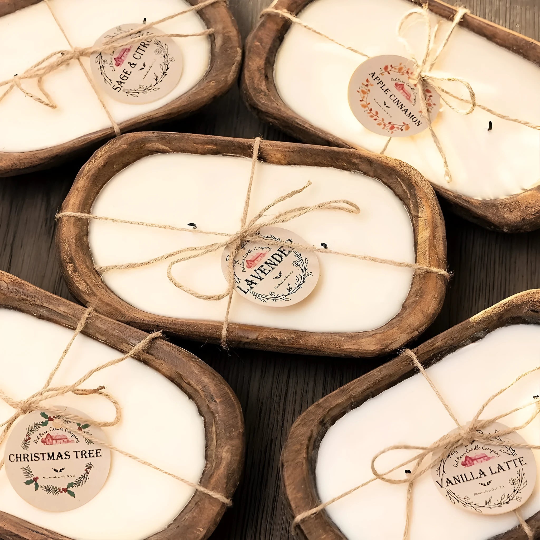 Retro wooden basin containing a lavender-scented soy wax candle with three visible wicks.