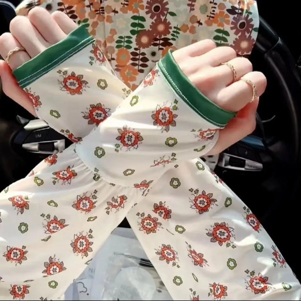 Ice silk printed oversleeves in floral and solid colour patterns providing arm sun protection