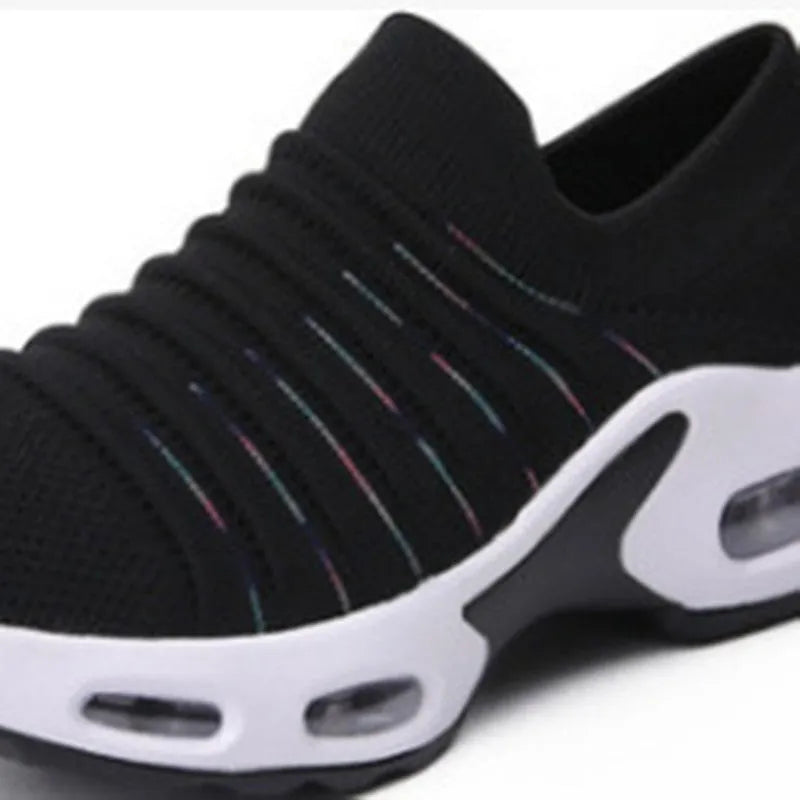 Plus size women's fly-knit stretch socks shoes in light gray with mesh upper and low heel.
