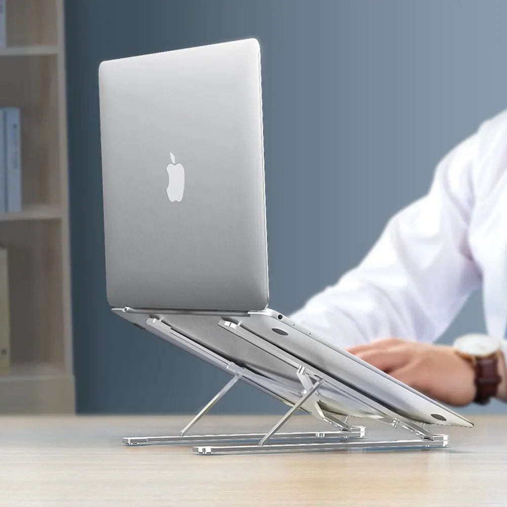 Portable aluminium laptop stand folded showing adjustable height mechanism