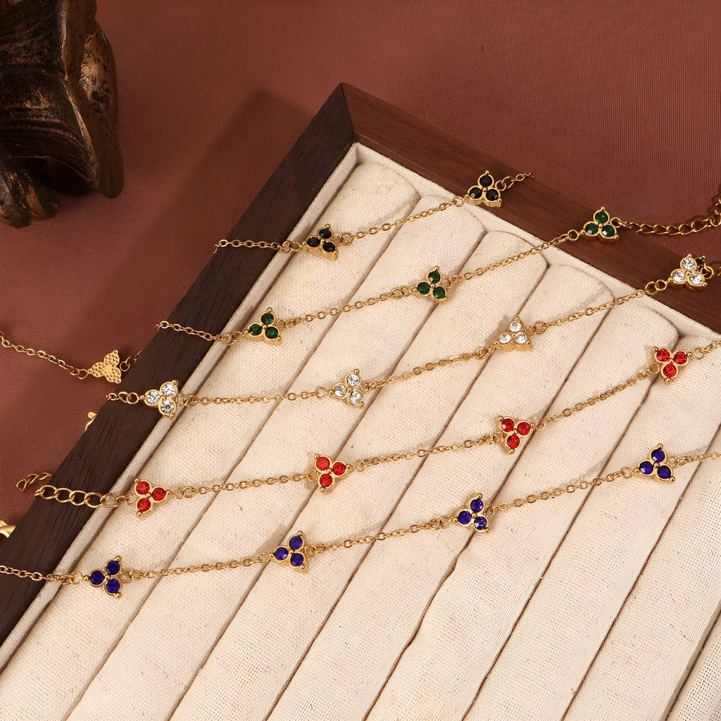 Women's stainless steel geometric triangle bracelet with three diamond stones and adjustable chain