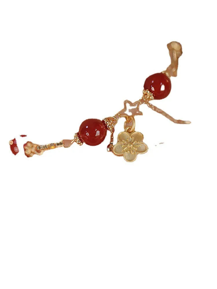 Red agate double layer bracelet for women with floral and peach blossom decorative elements.