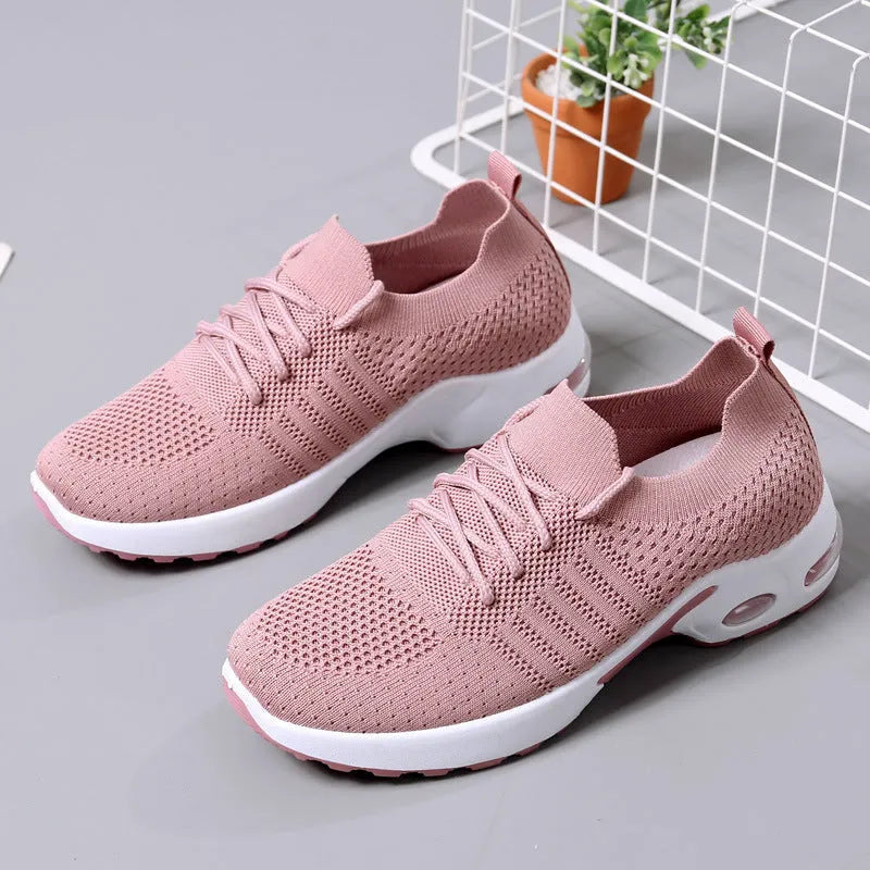 Women's black mesh casual sneaker with round toe and lace-up front on a non-slip PVC sole.