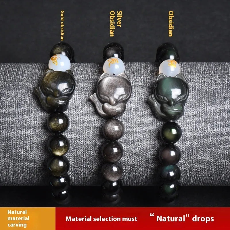Adjustable obsidian zodiac bracelet with 10mm beads on a wrist.