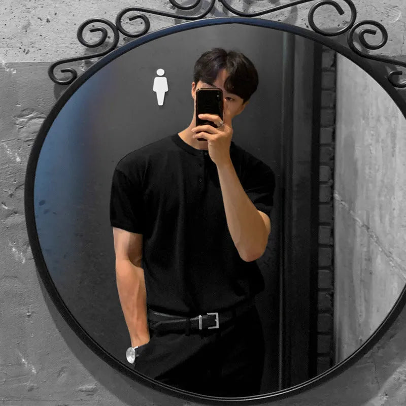 Men's black slim-fit ice silk knitted short-sleeve pullover shirt on a hanger.