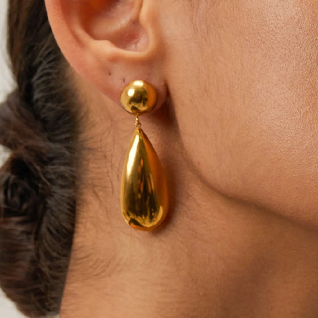 Gold hemisphere water drop pendant earrings with geometric design and electroplated finish