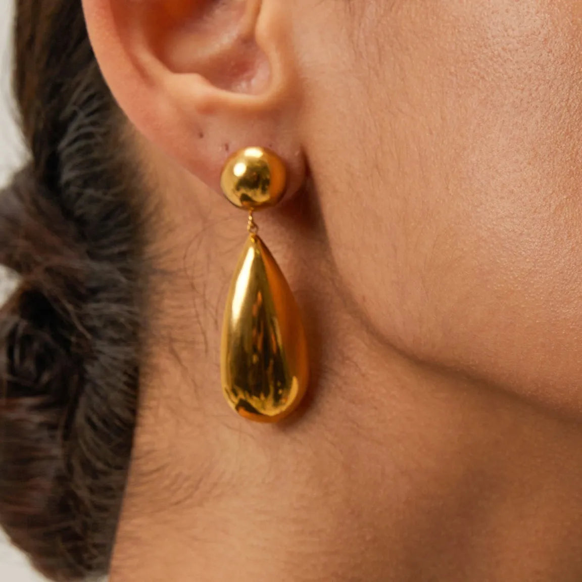 Gold hemisphere water drop pendant earrings with geometric design and electroplated finish
