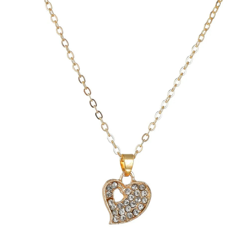 Gold-coloured women's jewellery set with earrings, item decoration and hand decoration featuring love patterns