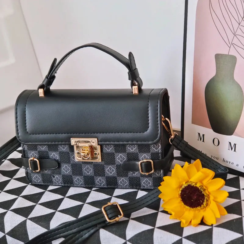 Retro ethnic pattern crossbody bag in horizontal square shape with file compartment.