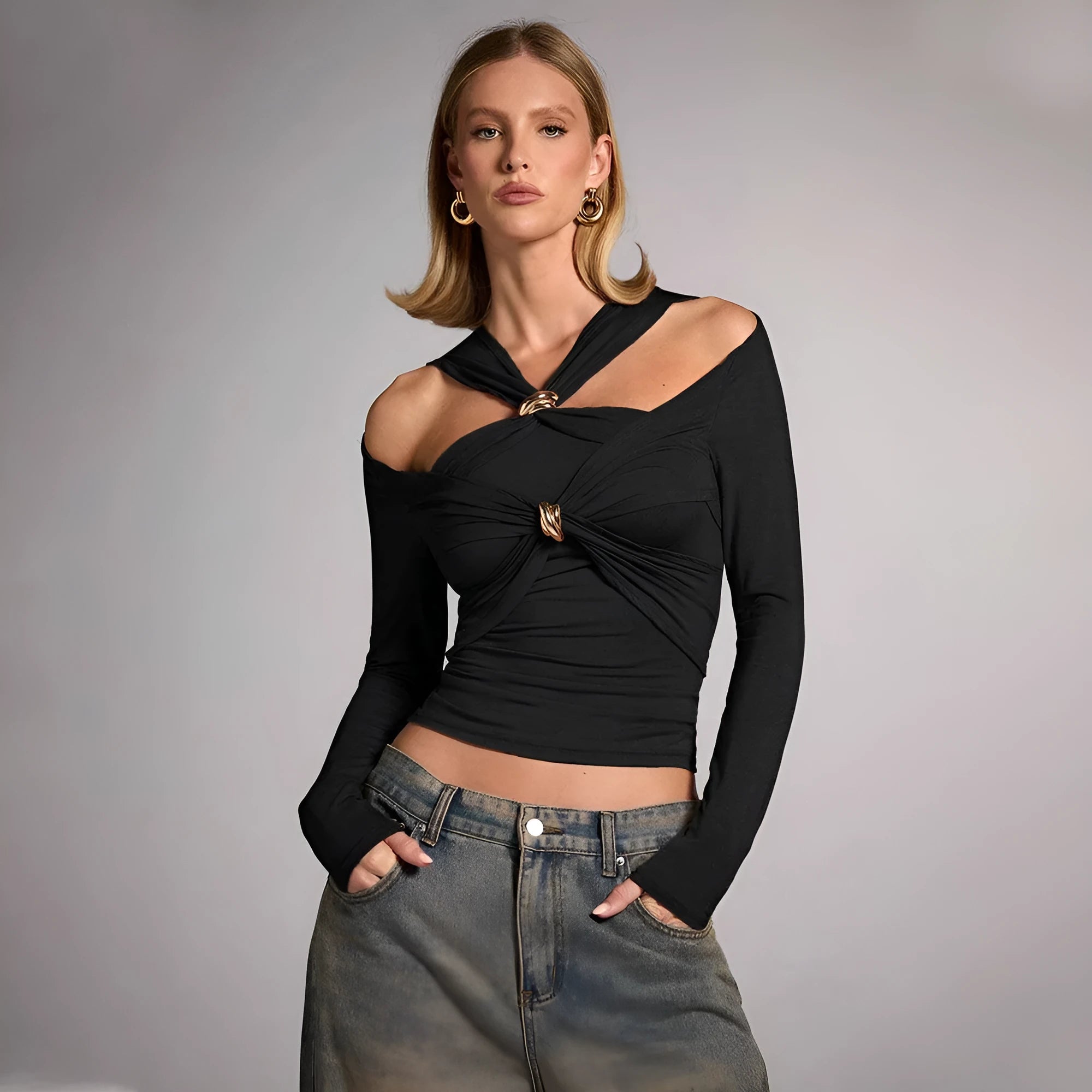 Black polyester women's halter top with long sleeves and shoulder-baring design