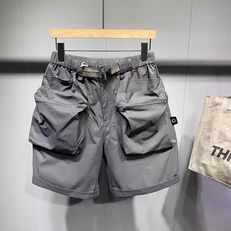 Men's large size workwear shorts in black with pockets and straight leg hem